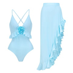 Ruffled one-piece swimsuit with floral detail and matching flowy maxi skirt