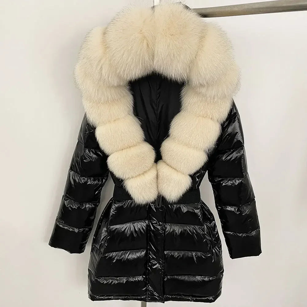 Black puffer jacket with large white fur collar
