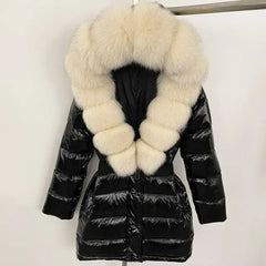 Black puffer jacket with large white fur collar
