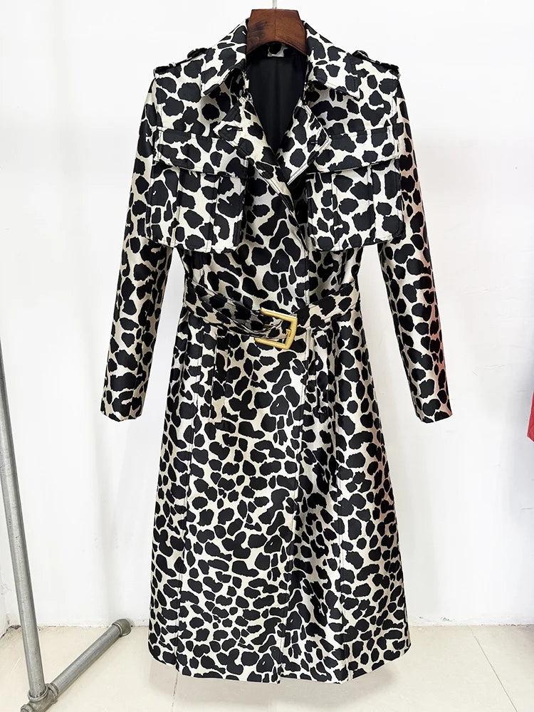 Leopard print belted trench coat hanging on a rack