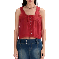Red lace top worn by a model on a white background