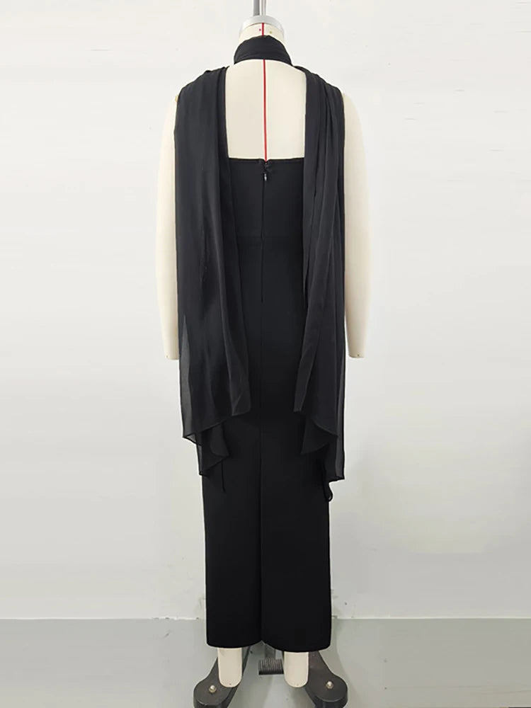 Black outfit on a mannequin against a white background
