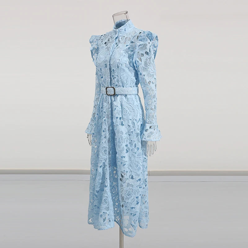 Light blue floral dress on a mannequin against a plain background
