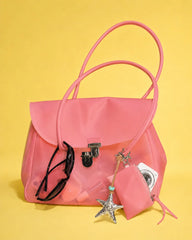 Transparent tote bag with sunglasses and coin purse