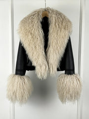 Black faux leather jacket with cream fur collar and cuffs
