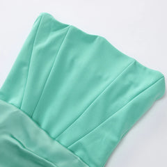 Close-up of a light green fabric on a white background