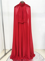 Red dress on a mannequin against a white background
