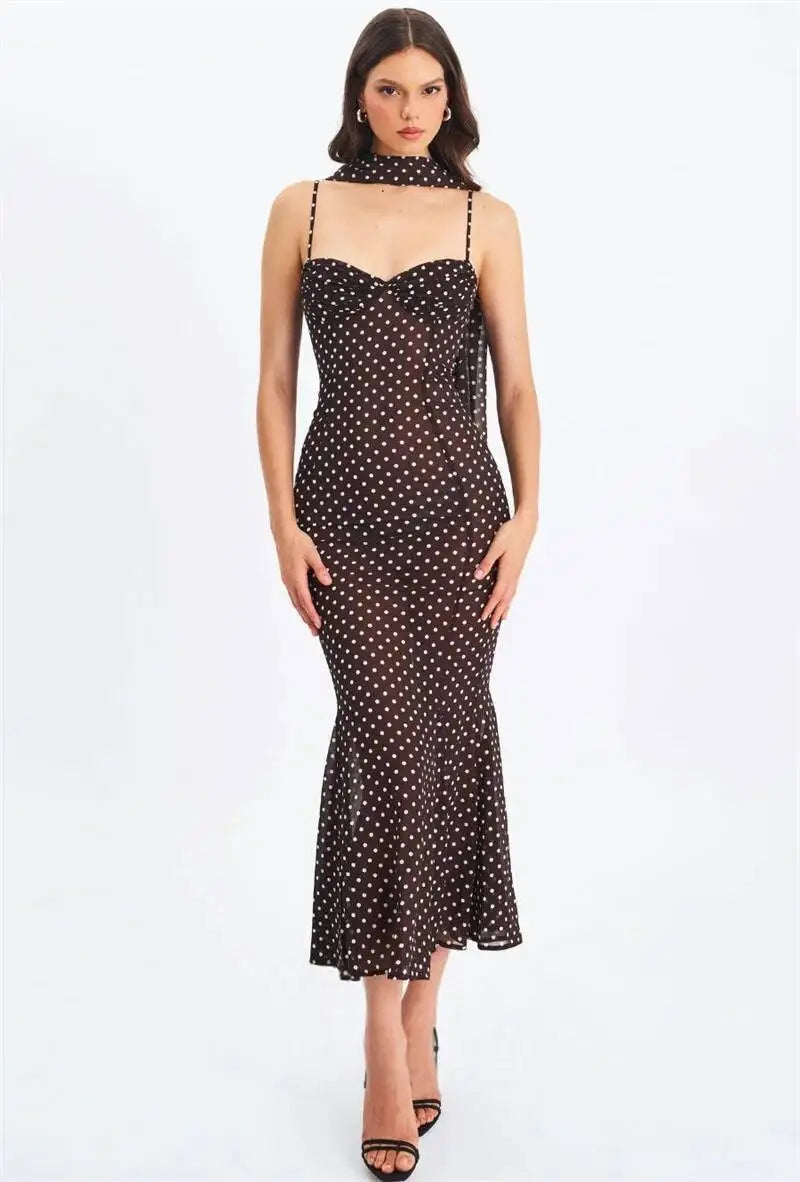 Detail of polka dot print on maxi dress