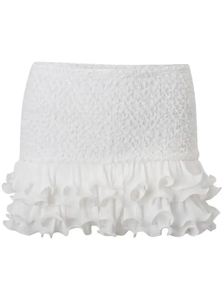 White textured skirt with ruffled hem on a white background