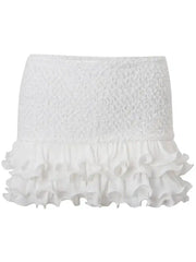White textured skirt with ruffled hem on a white background