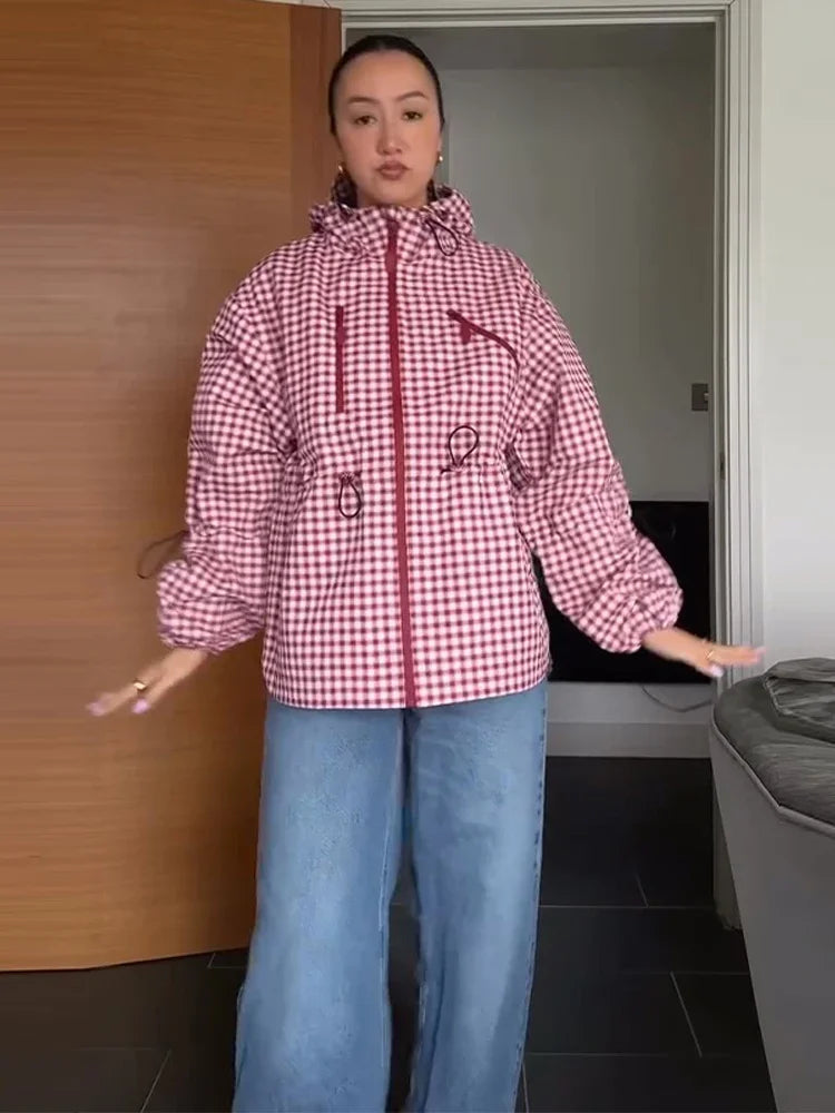 Pink gingham hooded jacket worn with jeans