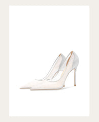 White high-heeled shoes with clear mesh panels on a light beige background