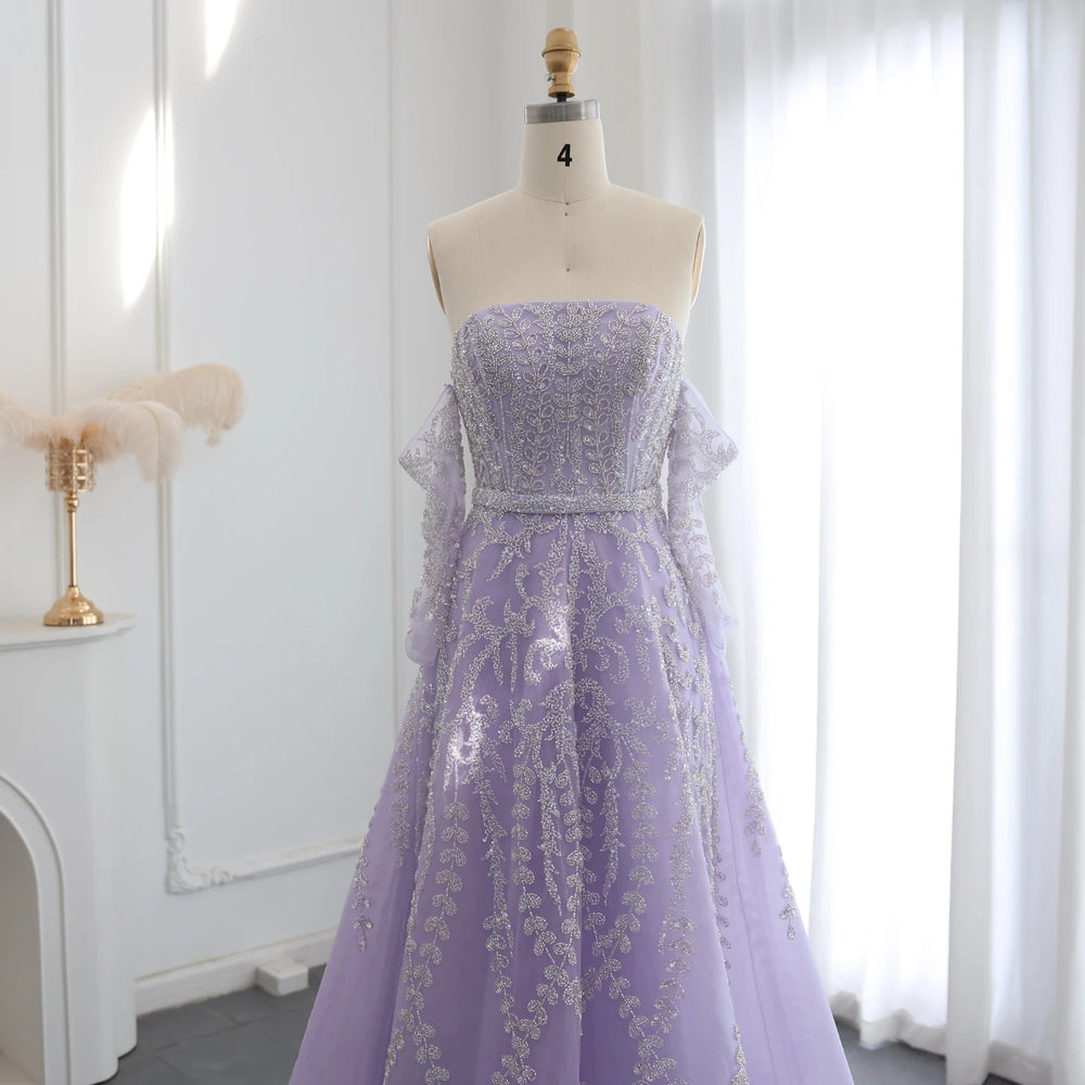 Lavender evening gown on a mannequin against a white wall.