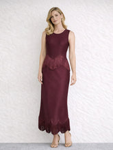 Burgundy sleeveless O-neck maxi dress with fringe trim at the waist and hem.