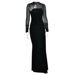 Black evening gown with sheer sleeves on a white background