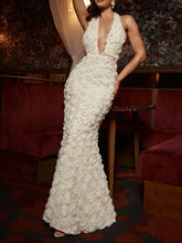 White flower applique halter dress with sculpted silhouette