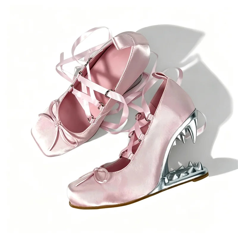 Pink satin square toe shark tooth wedge heels viewed from above