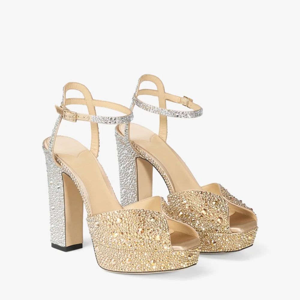 Gold crystal embellished platform sandals with a chunky block heel and ankle strap.
