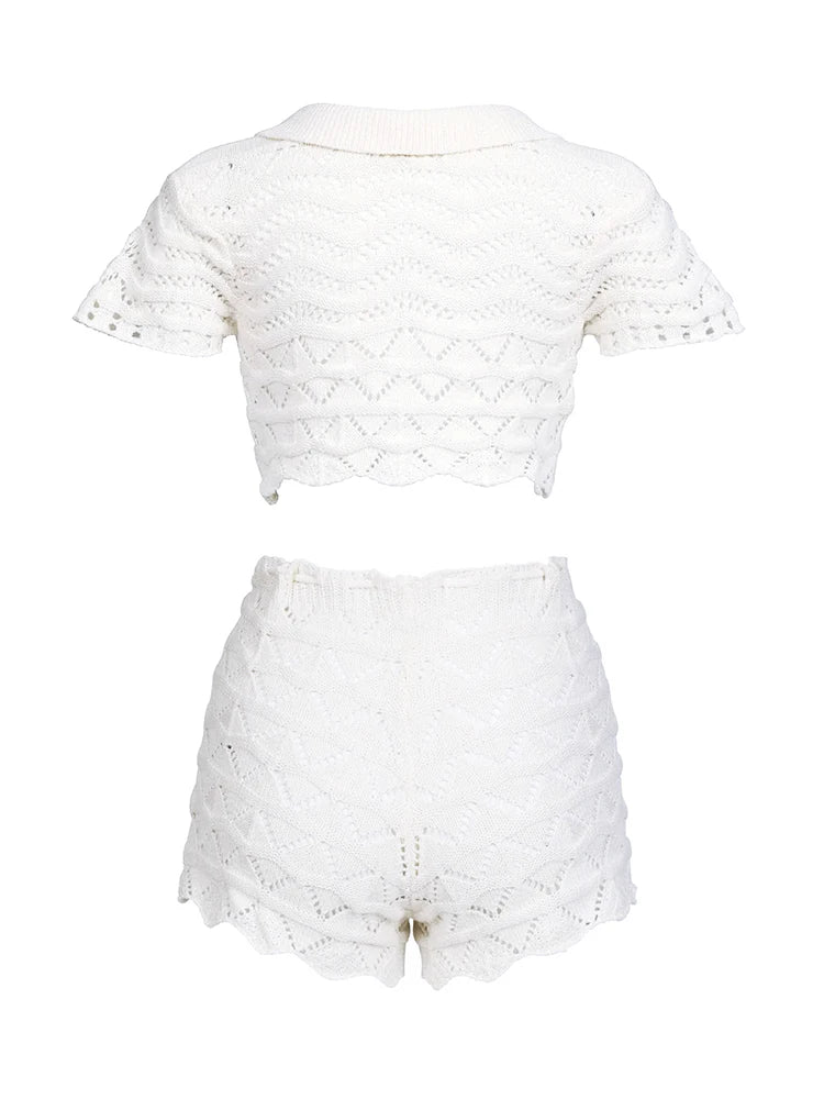 White lace top and shorts set on a white background