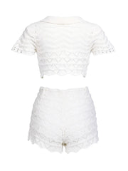 White lace top and shorts set on a white background