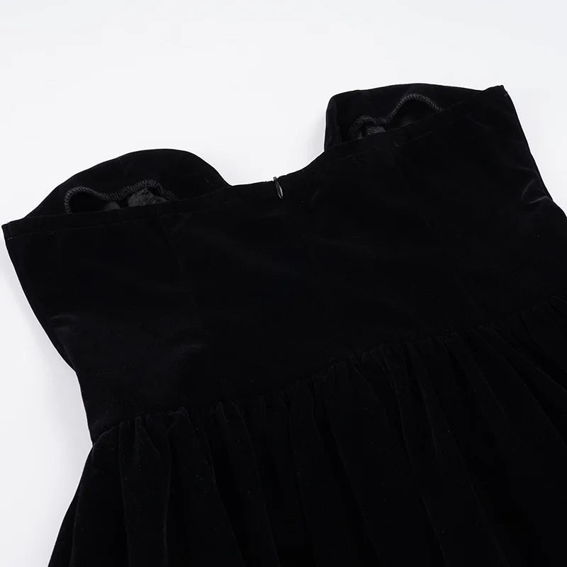 Black sleeveless dress on a white background