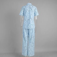 Light blue lace outfit on a mannequin against a gray background