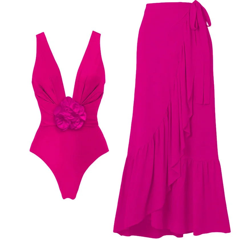 Fuchsia one piece swimsuit and wrap skirt