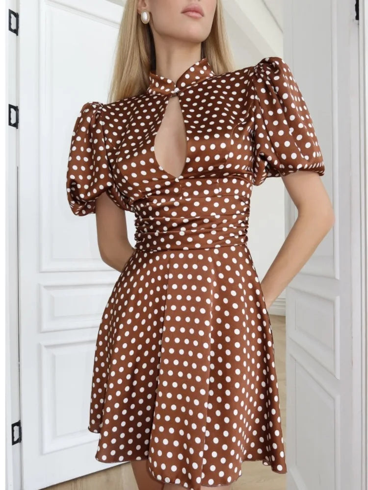 Polka dot keyhole neck puff sleeve dress front detail