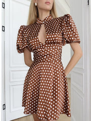 Polka dot keyhole neck puff sleeve dress front detail