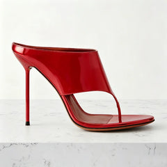 Red patent thong heel shoe.