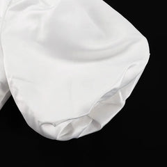 White dress on a black background