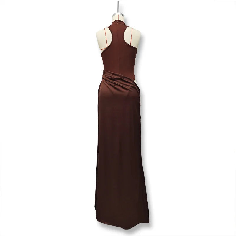 Brown evening gown on a mannequin against a white background