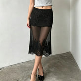 Sheer midi skirt with lace trim and slim fit.