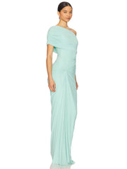 Woman wearing a light blue one-shoulder dress on a white background