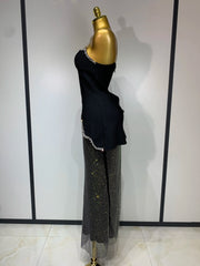 Black rhinestone corset top & sequin skirt.