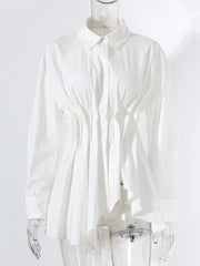 White shirt on a mannequin against a white background