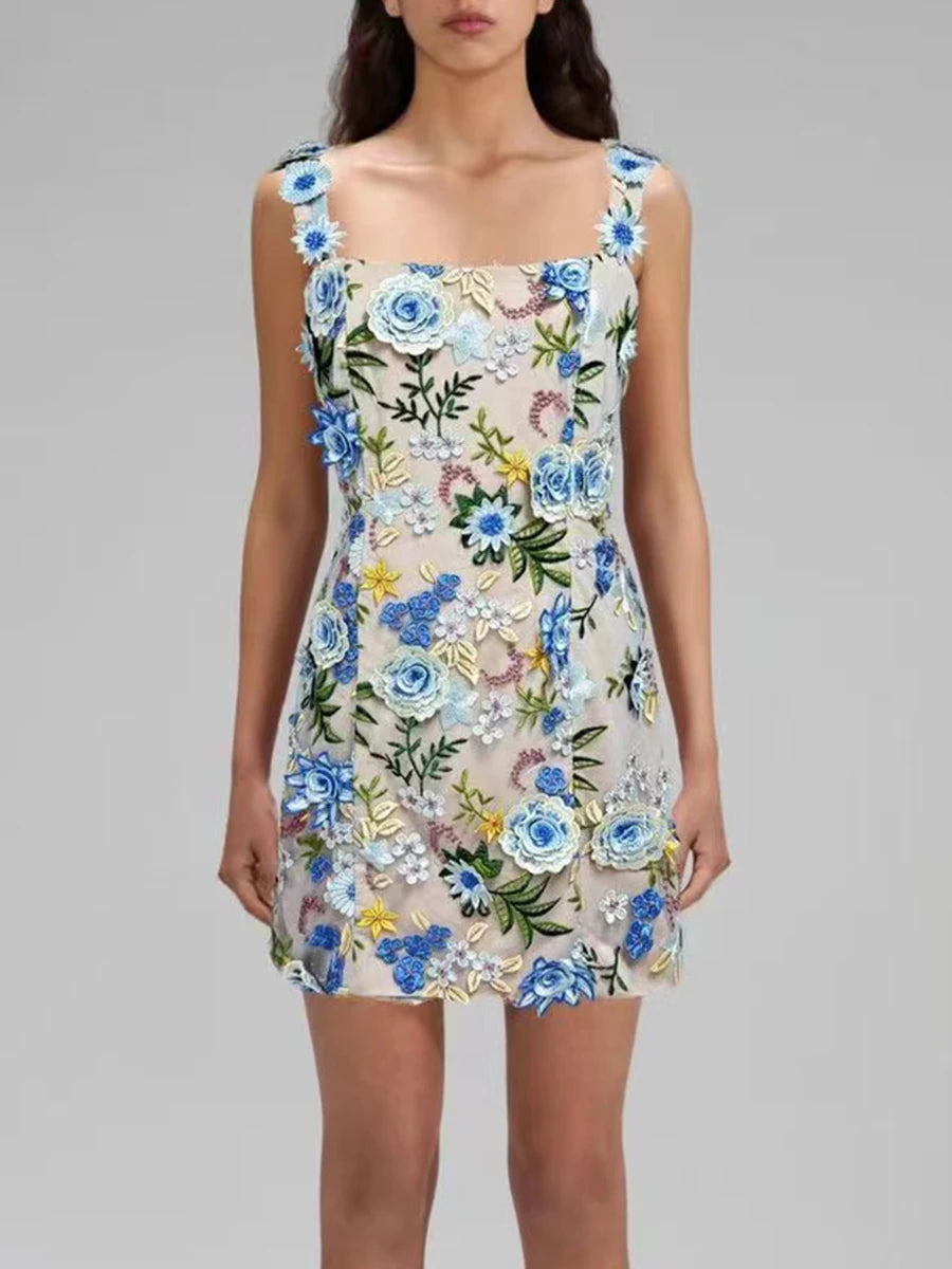 Floral dress with blue flowers on a gray background