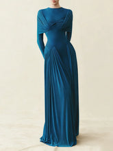 Blue evening gown on a neutral background