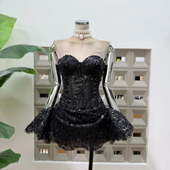 Black strapless floral lace mini dress with sequin embellishments.