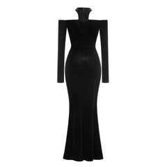 Studio shot of black velvet off-shoulder deep v-neck fishtail evening dress