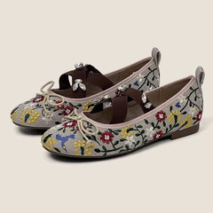 Embroidered floral print Mary Jane flats with crystal embellished crisscross straps