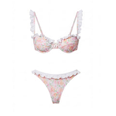 Printed bikini top and bottom with white ruffle trim.