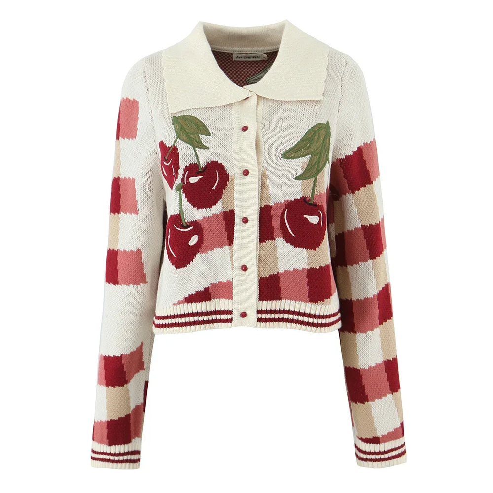Knitted cardigan with cherry pattern on a white background