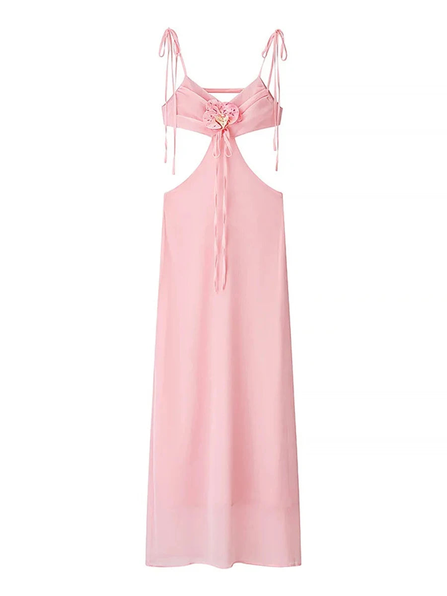 Pink slip dress with thin straps on a white background