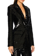 Black sequin blazer worn by a model on a white background