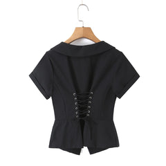 White lapel collar corset top displayed on a hanger