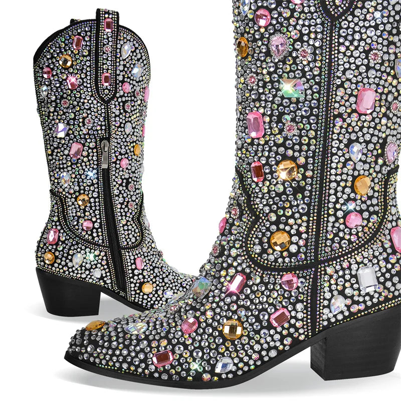 Decorative cowboy boots with colorful gemstones on a white background