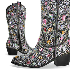 Decorative cowboy boots with colorful gemstones on a white background