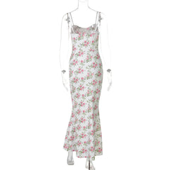 Floral dress on a mannequin against a white background