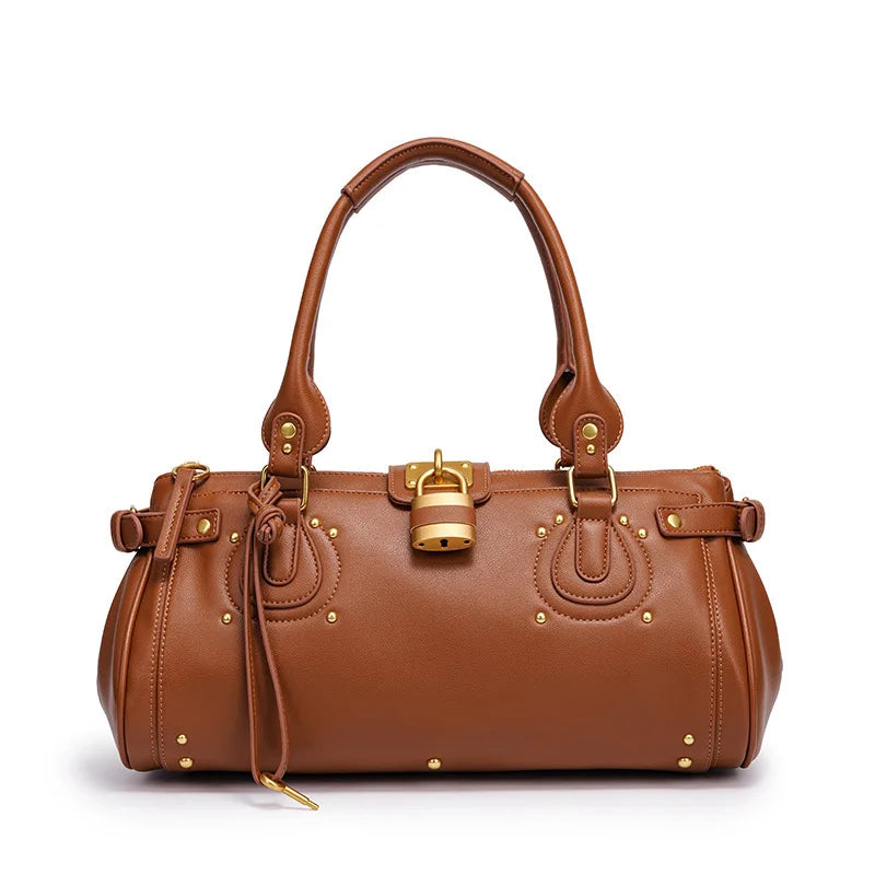 Brown studded lock top handle bag